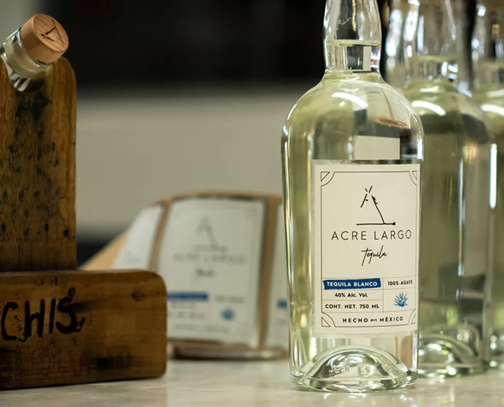 close up of acre largo blanco tequila bottle